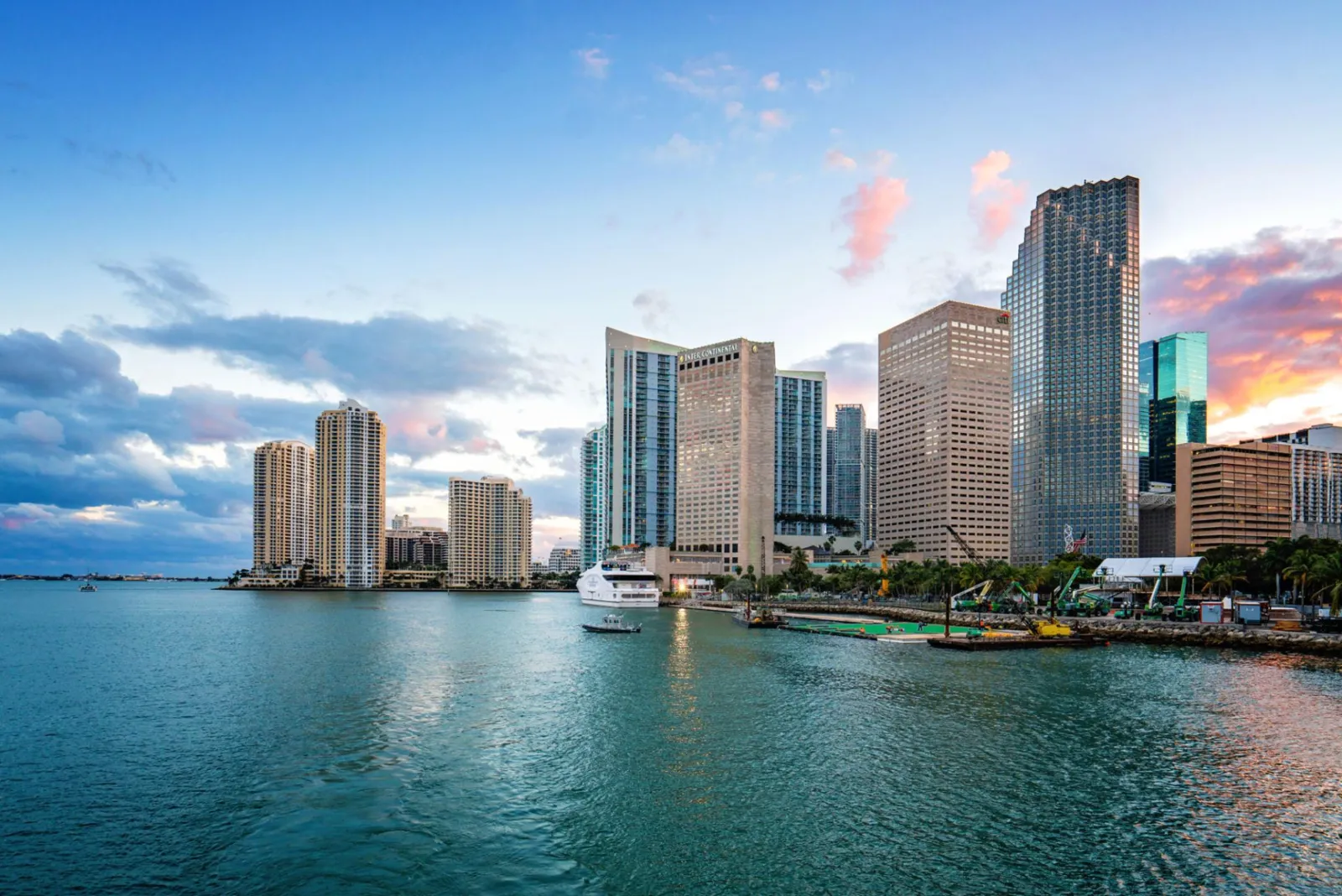Downtown Miami and Brickell skyline over Biscayne Bay at dusk